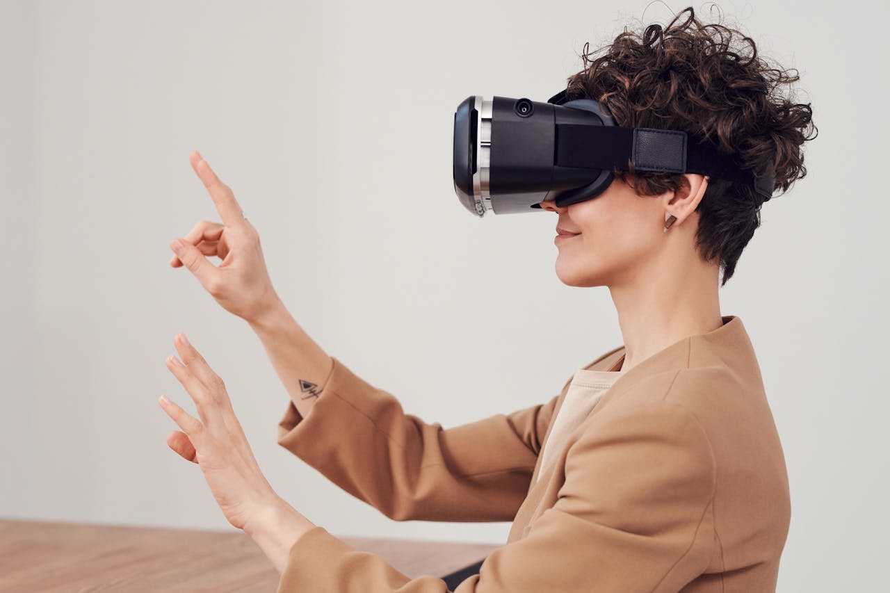 Services A woman engaging with virtual reality technology using a VR headset for an immersive experience.